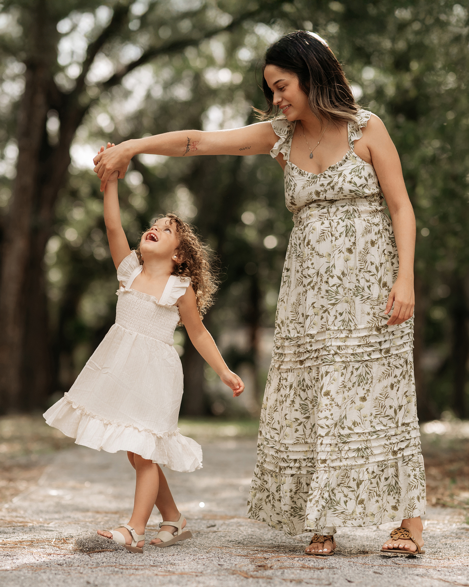Orlando family photographer capturing a family with children during an outdoor photo session.