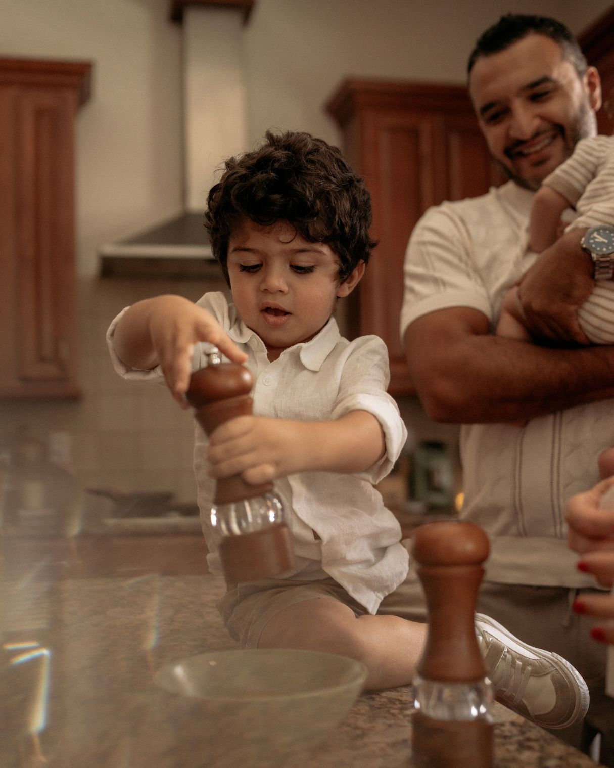 Parents and children enjoying time together at home during an Orlando family photography session
