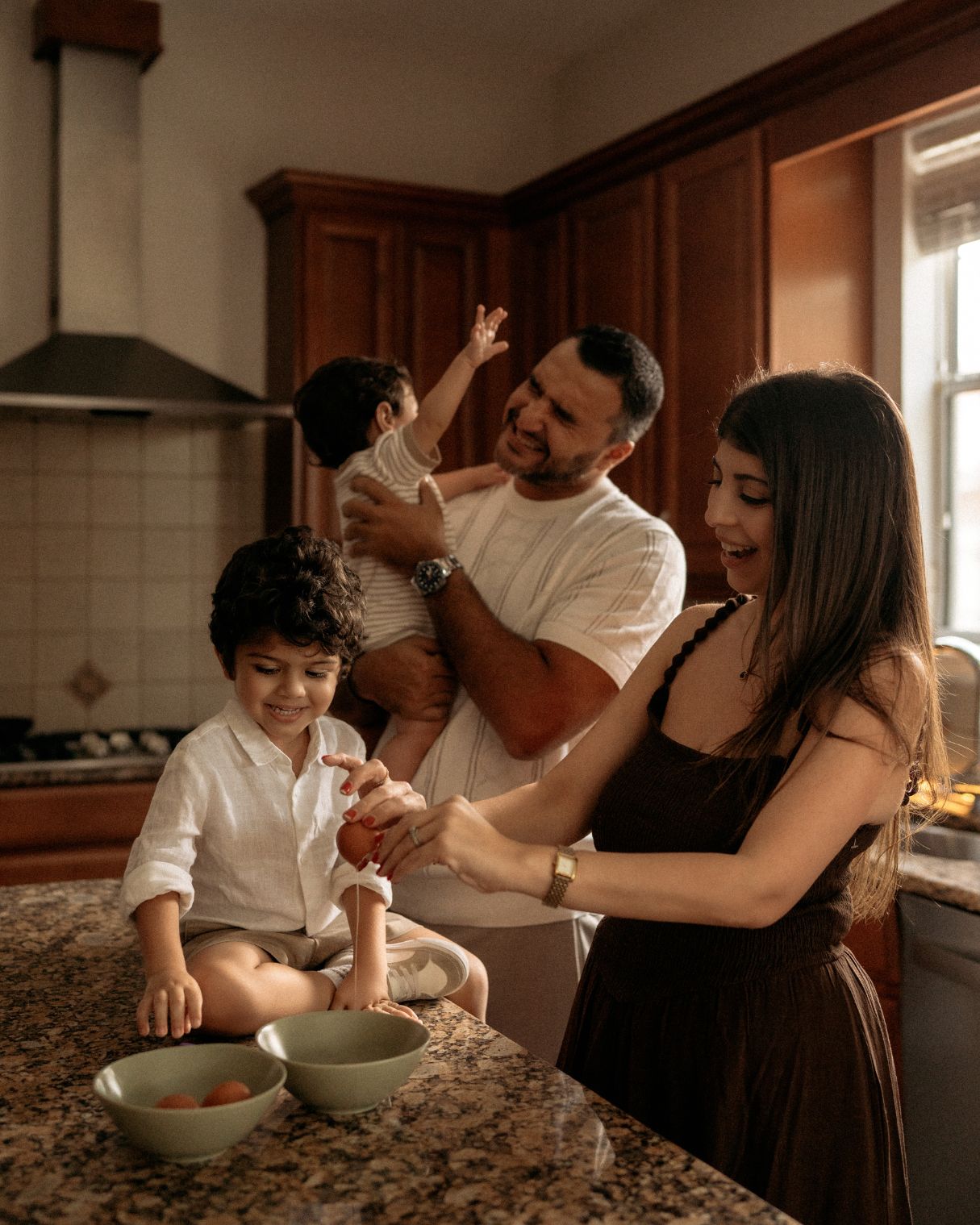 Natural candid moment between parents and children photographed during an Orlando family session
